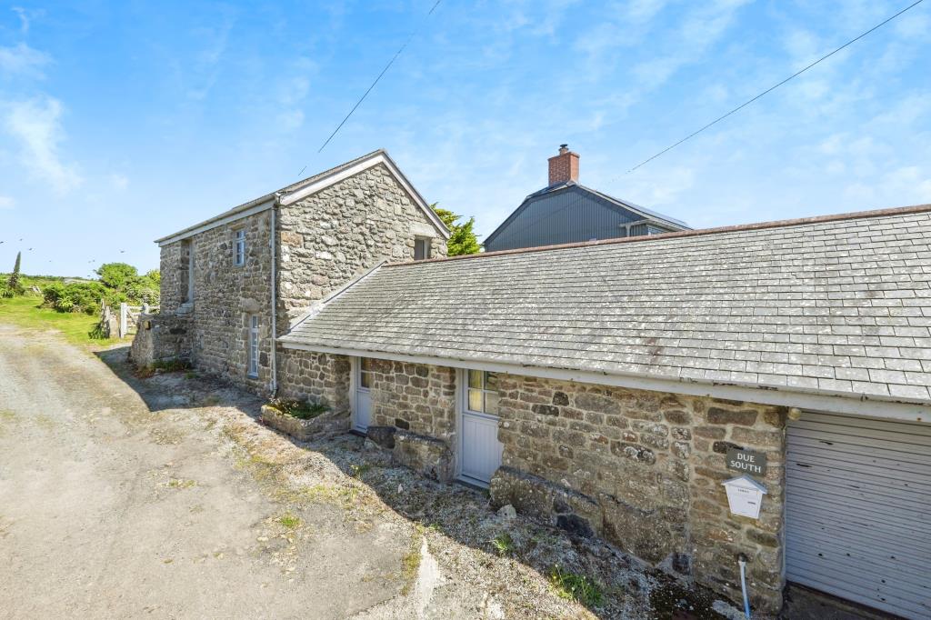 Lot: 72 - DETACHED BARN CONVERSION IN A LOVELY COUNTRYSIDE SETTING - Exterior of property from alternative angle - photograph provided by seller
